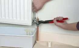 An-engineer-is-trying-to-bleed-a-radiator-f
