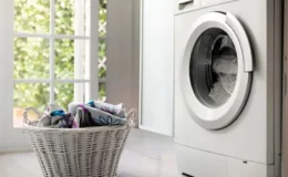 A-washing-machine-and-laundry-basket-in-laundry-room-