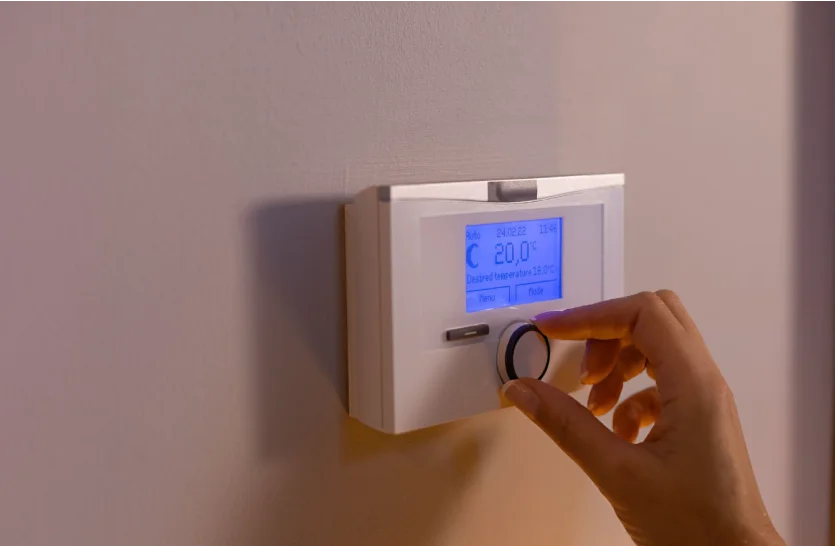 A-homeowner-is-turning-down-the-room-temperature