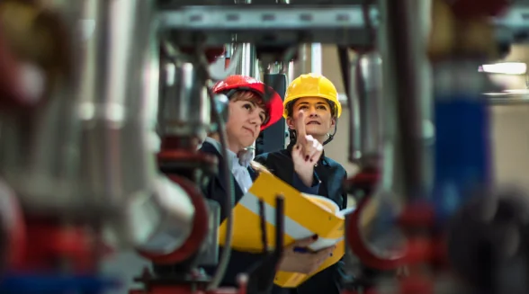 Two-engineers-are-checking-a-boiler-system