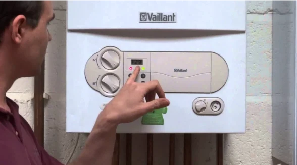 homeowner-is-checking-his-boiler