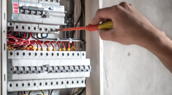 technician-is-repairing-the-loose-connections-in-the-circuit-breaker