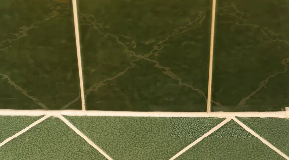 closeup-of-newly-regrouted-tiled-floor