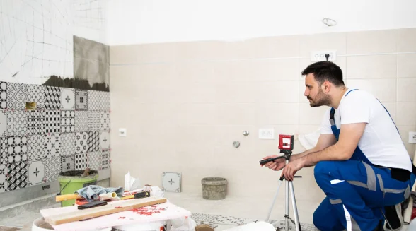 tradesperson-is-tiling-a-bathroom
