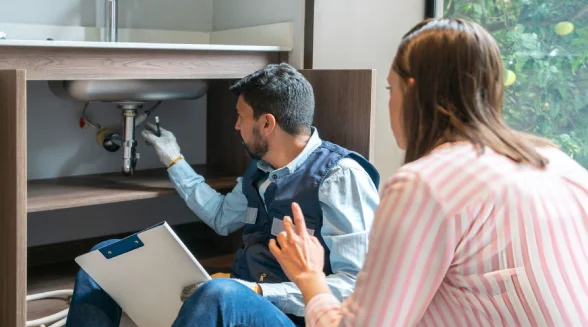 plumber-explaining-how-to-protect-plumbing