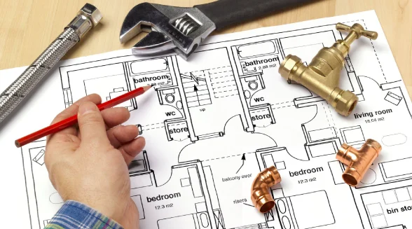 plumber-with-a-blueprint