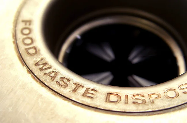 close-up-of-a-jammed-garbage-disposal