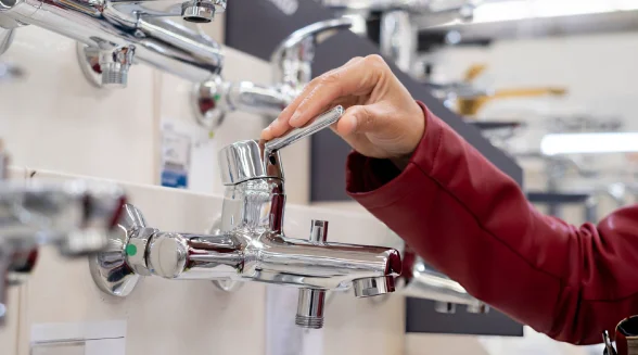 person-is-inspecting-a-tap