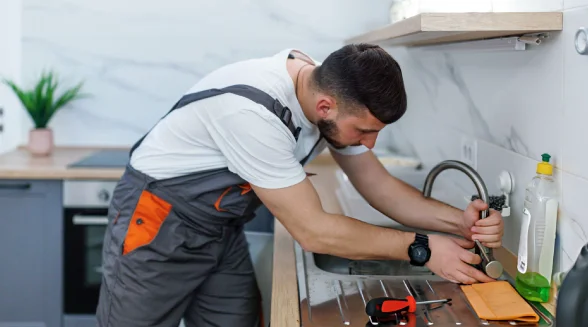 plumber-is-fixing-a-hose-tap-fitting