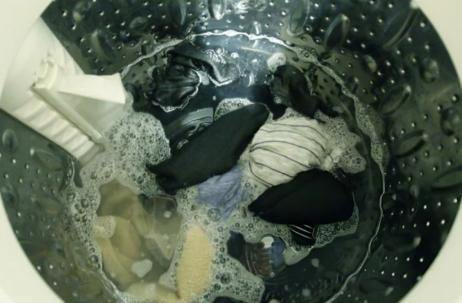 close-up-of-laundry-in-a-washing-machine-reflecting-the-users-issue-my-washing-machine-will-not-fill-up-with-water